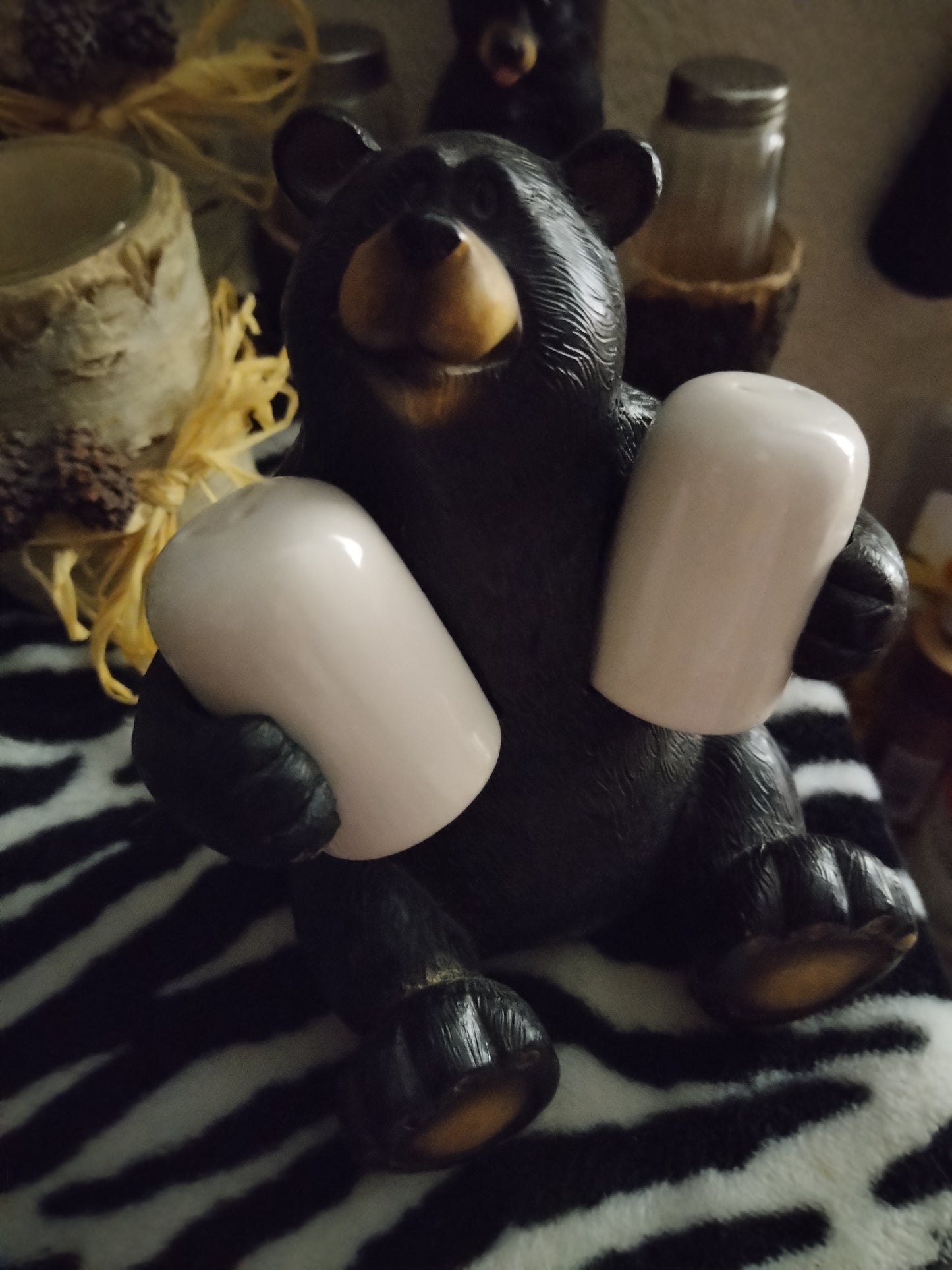 Black Bear Figurine Holding 2 Barrels